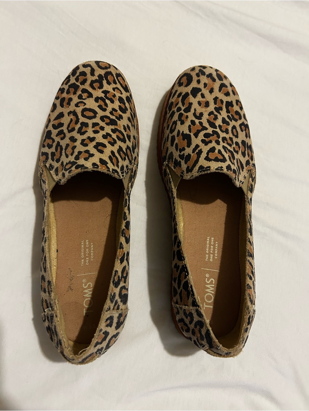 TOMS Leopard Canvas Slip-Ons in Tan and Black